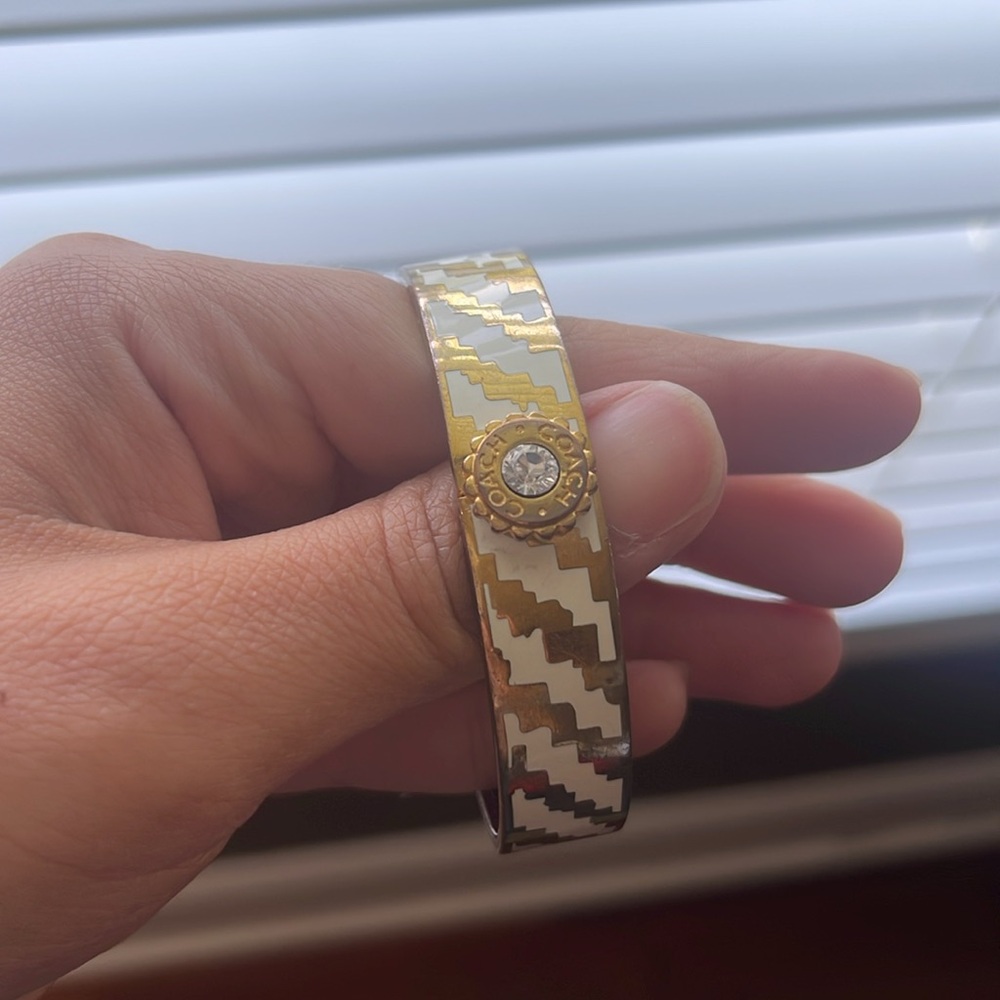 Gold and white Coach Bangle